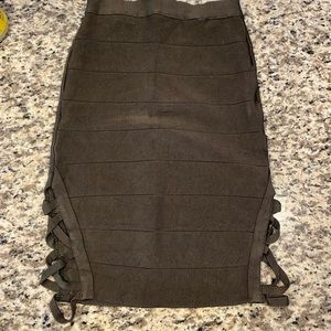 Dark Green Bebe skirt with cropped top.